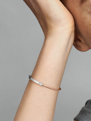 FINAL SALE - Pandora Signature Two-tone I-D Pavé Bangle - Sterling silver, 14k rose gold plating