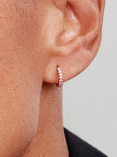 Sparkling Pink Huggie Hoop Earrings - 14k rose gold plating