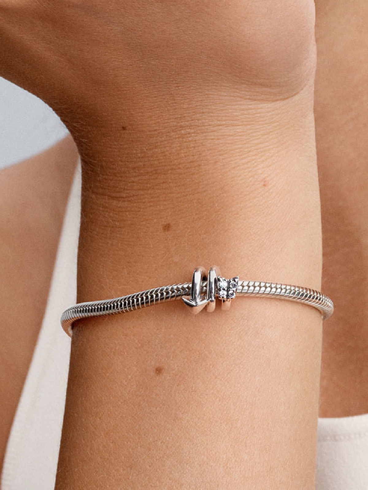 Twisting Arrow Charm - Sterling silver